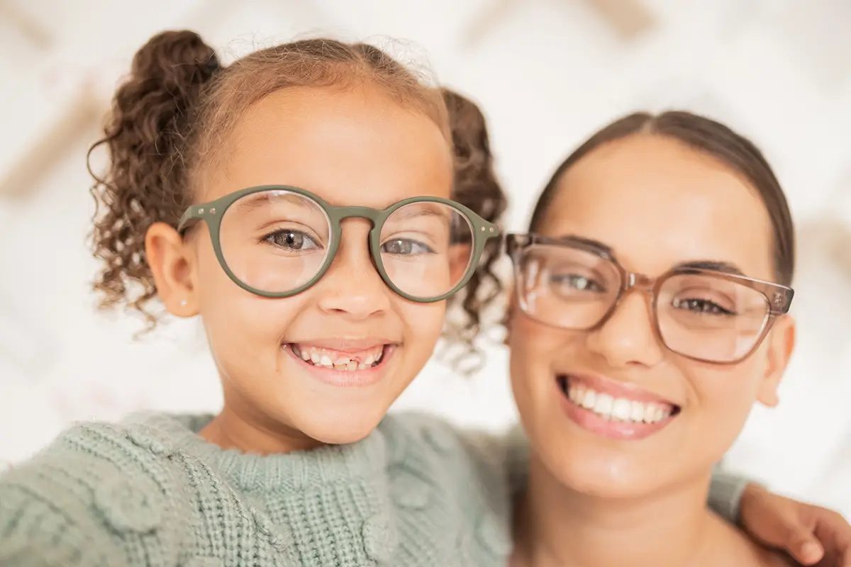 mother and daughter getting glasses